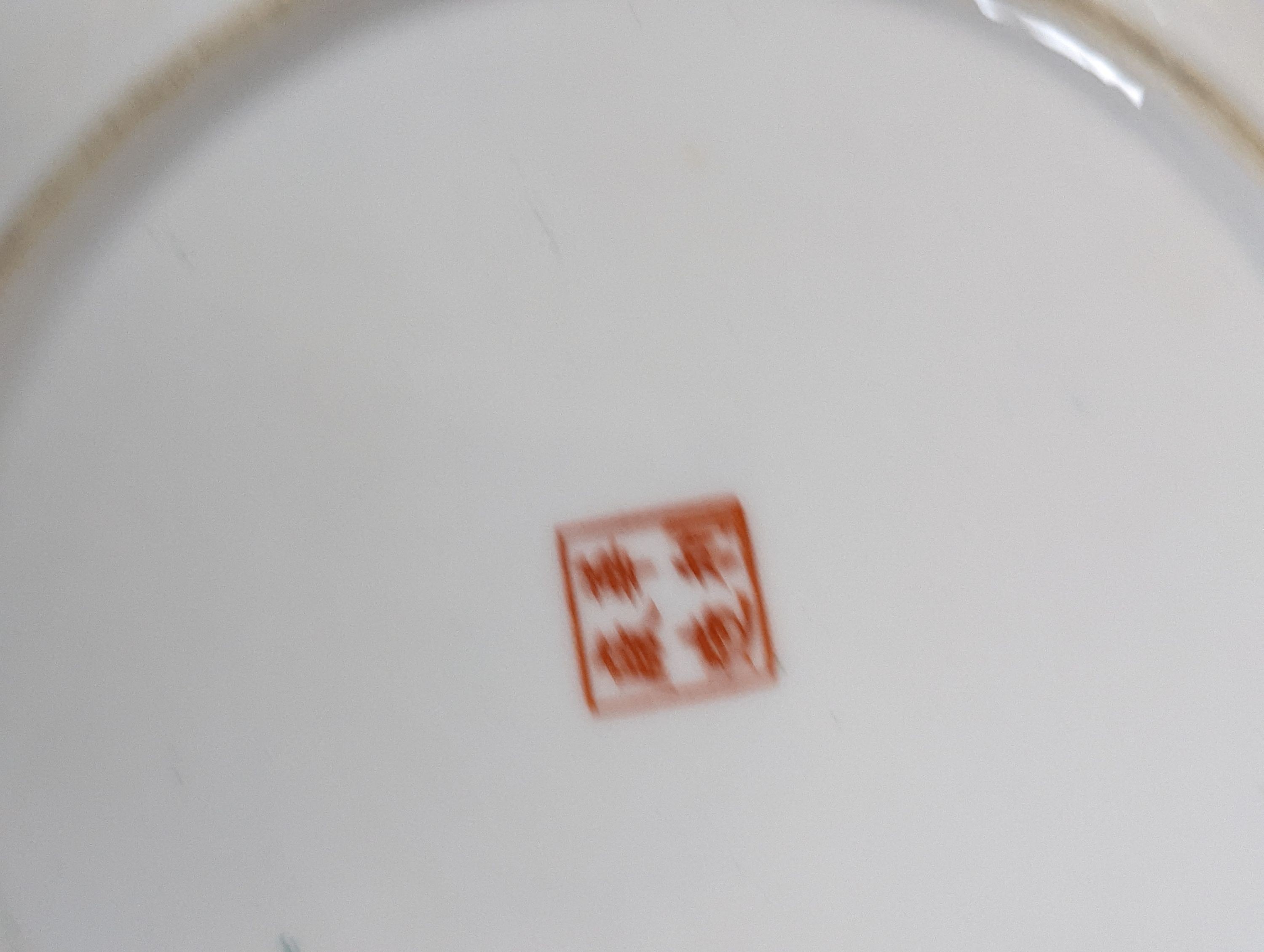 A group of Chinese enamelled porcelain plates, dishes, covers, cups and a vase